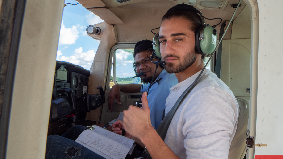 Student and instructor inside the aircraft before departure