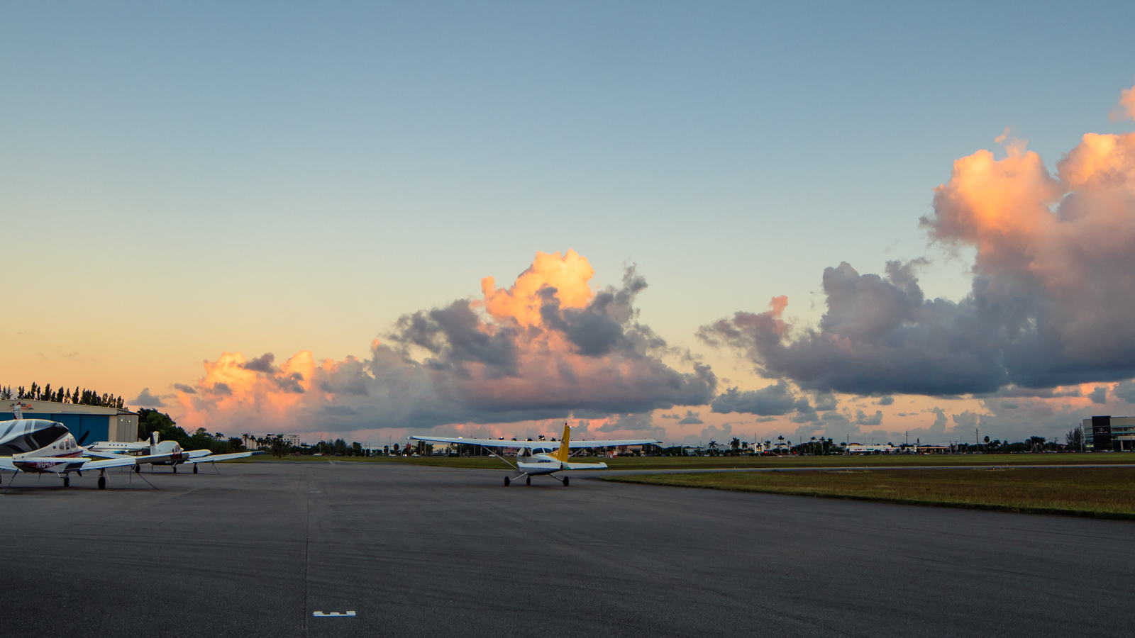 Training aircraft on the ramp at sunset